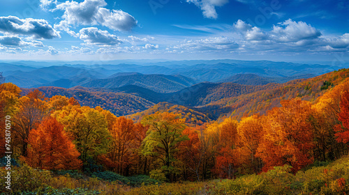 A panoramic view of a mountain range during autumn.