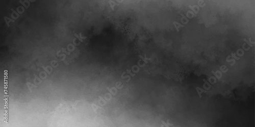 Black background of smoke vape,nebula space brush effect,smoke swirls.spectacular abstract misty fog.ice smoke clouds or smoke powder and smoke,ethereal vintage grunge. 