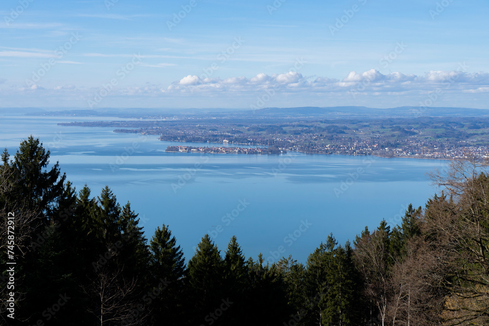 view on to the island of lindau with lake constance and mountains