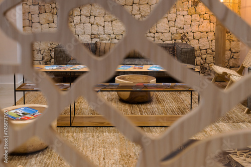 Empty waiting room behind a wooden wall in a rustic hotel. Tourism concept photo