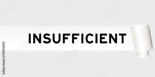 Ripped gray paper background that have word insufficient under torn part