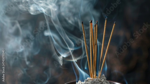 close up Incense sticks burning with smoke isolated on background