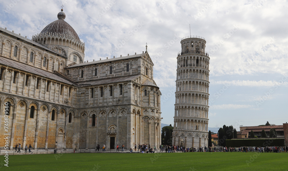 The Pisa Cathedral and The Leaning Tower of Pisa in Square of Miracles, Tuscany, Italy.