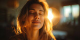 Warm Glow: Woman Embracing Light.
Close-up of a woman basking in warm sunlight with closed eyes.