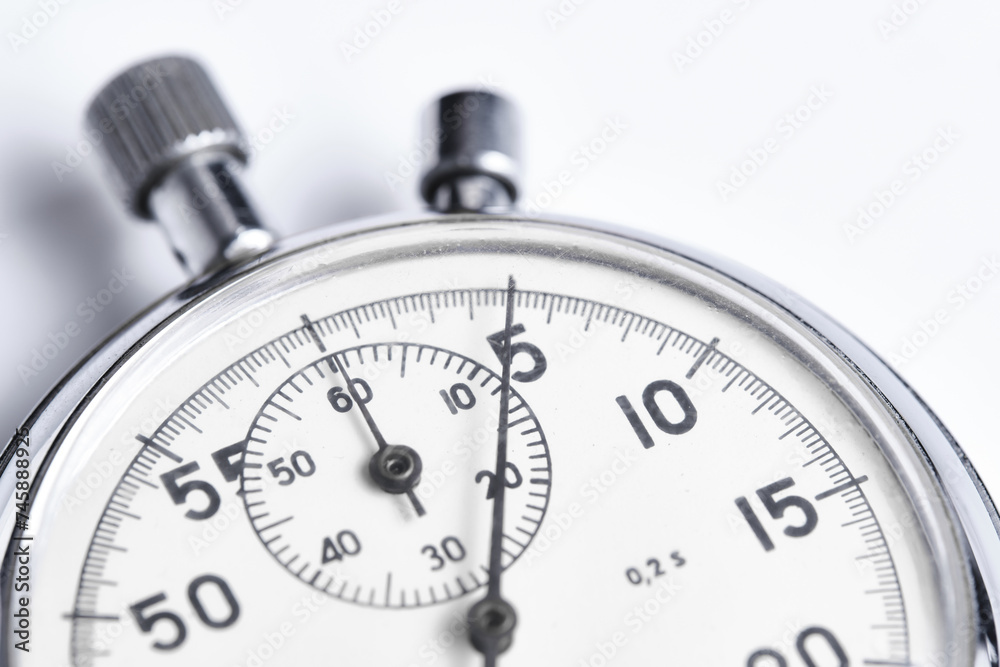Mechanical stopwatch white background closeup. Mechanical stopwatch white background closeup.