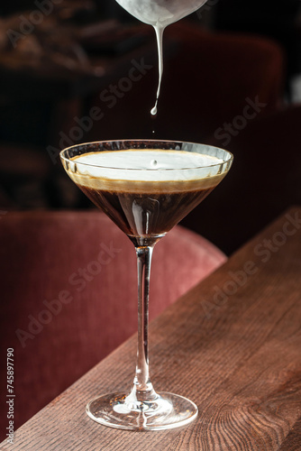 expresso coffee martini cocktail, alcoholic cocktail at the bar photo