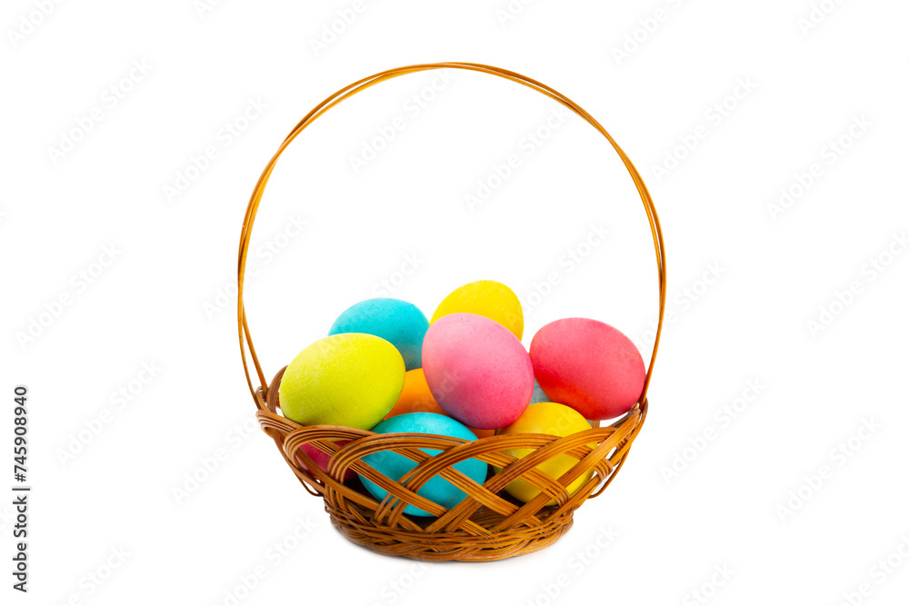 Easter basket filled with colorful eggs isolated on white background. Easter celebration concept. Colorful easter handmade decorated Easter eggs. Easter basket filled with colorful eggs isolated on white background. Easter celebration concept. Colorful easter handmade decorated Easter eggs.