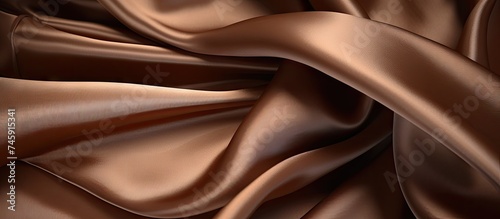 Elegant Evening Dress: Luxurious Brown Silk Fabric in Close-Up View