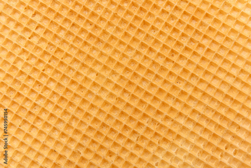 Waffle texture close up. Wafer sheet. homemade baking Waffle texture close up. Wafer sheet. homemade baking