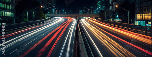 Dynamic traffic on a city highway, long exposure shot with vibrant light trails.