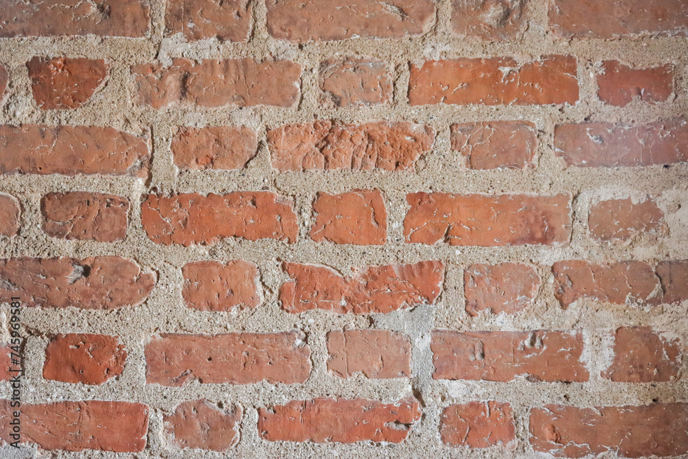 Naklejka premium Red brown old brick wall background grunge texture.