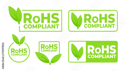 Green labels with a leaf icon indicating RoHS Compliant for electronics, promoting environmentally responsible manufacturing. photo