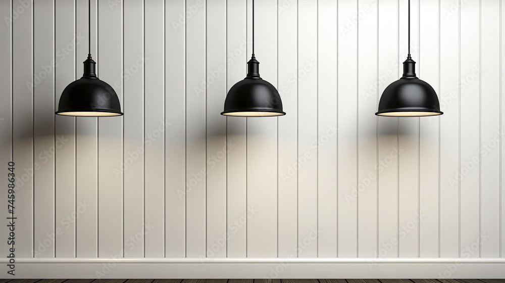 Obraz premium Three black lamps are suspended from a white wall with copy space