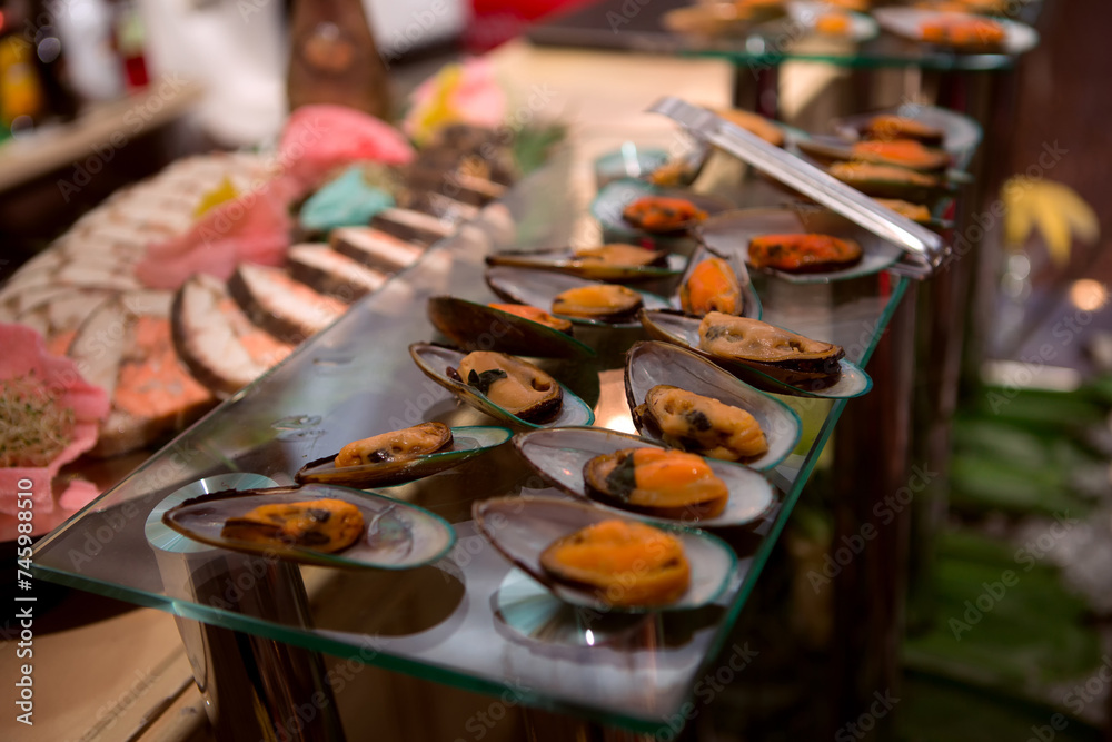 Variety of appetizers are served on buffet table