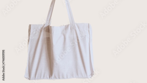White Stylish Blank Tote Bag Mockup Isolated on White Background. Customizable Canvas Fashion Template