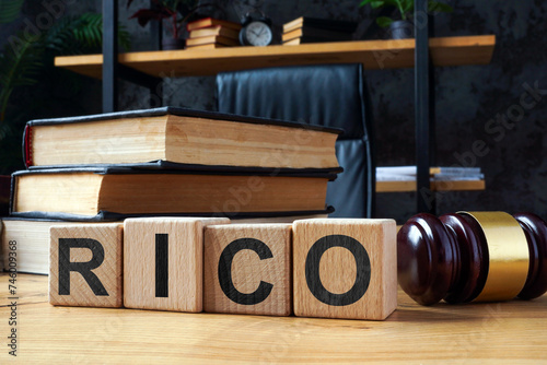Cubes with letters RICO Racketeer Influenced and Corrupt Organizations Act and gavel.