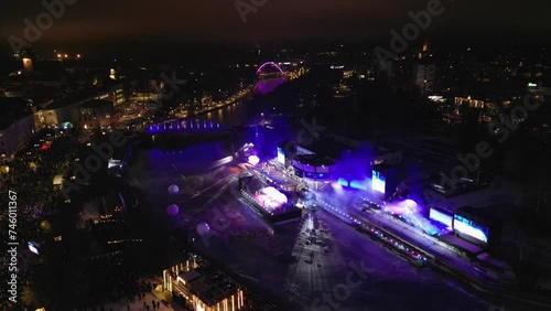 Aerial images of the inaugural event of Tartu European Capital of Culture 2024, the river is the place where the stage is placed, the robotic lights generate an impressive image. photo