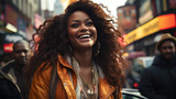 portrait of a female afro american person in the city laughing at the street