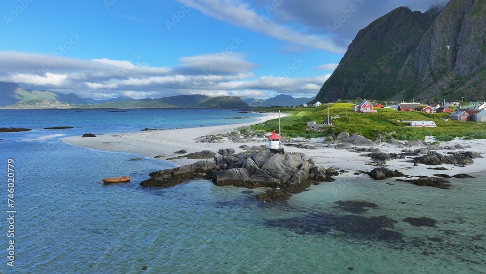 Canoe and lighthouse on the Lofoten Islands, Norway