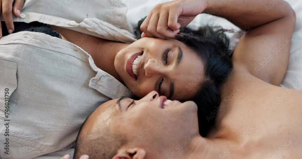 Happy couple, relax and bed for morning romance or love in embrace, trust or care above at home. Young man and woman smile lying in bedroom rest for conversation, passion or bonding together at house Happy couple, relax and bed for morning romance or love in embrace, trust or care above at home. Young man and woman smile lying in bedroom rest for conversation, passion or bonding together at house