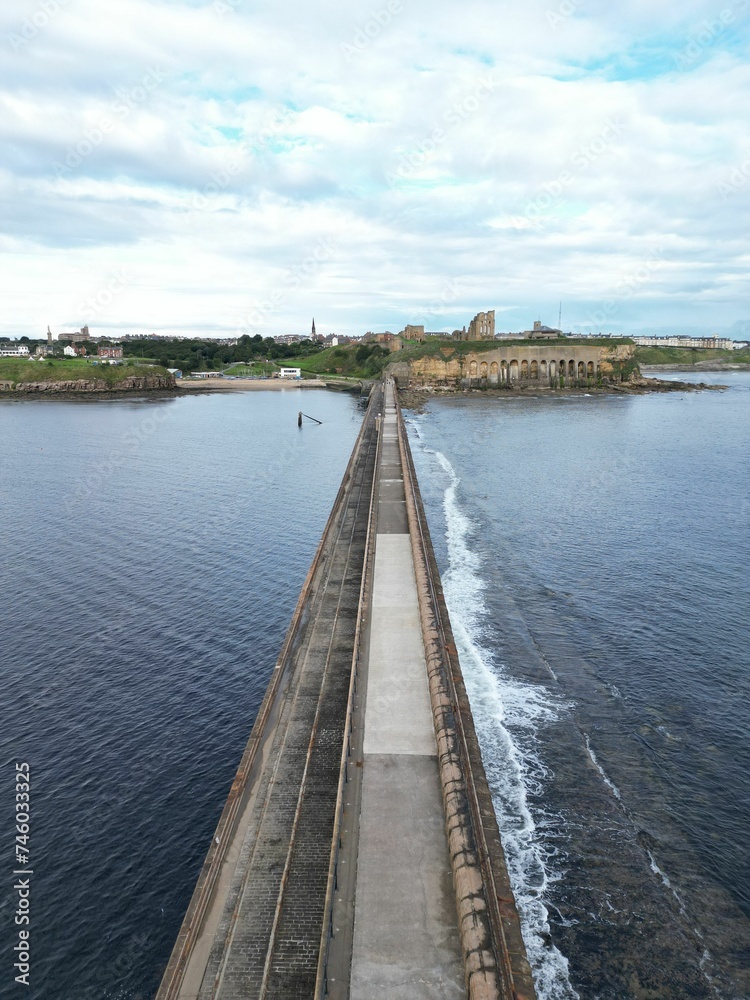 the bridge is going over the water towards the village of gozo