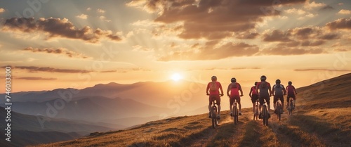 Mesmerizing Low-Angle Views of Cross-Country Bikers Embarking on an Adventure Through Mountainous Terrain During the Sunrise © Being Imaginative