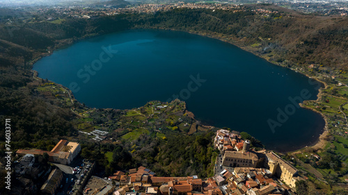 Aerial view of Lake Nemi. It is a small circular volcanic lake in the Alban Hills, near Rome in the Lazio region of Italy. It was formed in an ancient volcanic crater.
