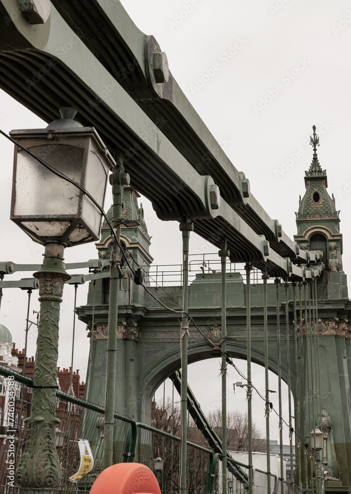 Design Architecture of Hammersmith Bridge. One of the world's oldest suspension bridges and a major river crossing and primary route in west london, Space for text, Selective focus. Design Architecture of Hammersmith Bridge. One of the world's oldest suspension bridges and a major river crossing and primary route in west london, Space for text, Selective focus.