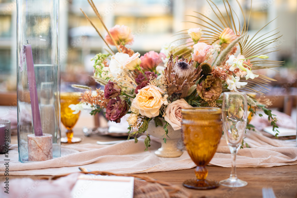 A centerpiece is a central decorative object, often flowers, candles or fruit, and is an important part of the wedding reception decoration.