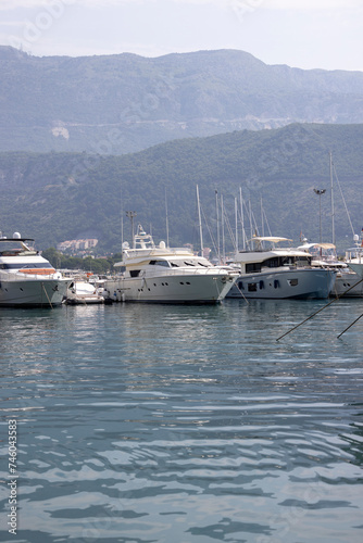 View of Budva Marina, picturesque port on the Adriatic Sea with moored ships, Budva, Montenegro