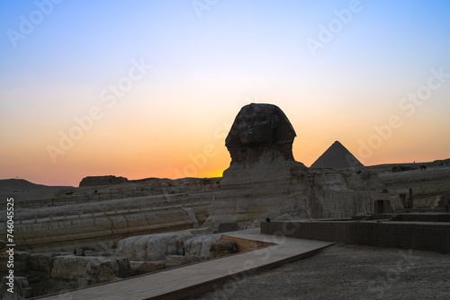 Great Sphinx of Giza, a limestone statue of a mythical creature with head of human and body of lion, the face appears to represent Pharaoh Khafre, stands on Giza Plateau on west bank of Nile, Egypt