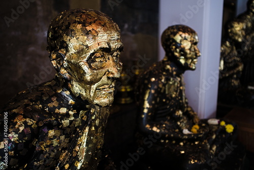 Monks with golden slices on them