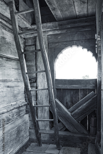 Wooden architectural detail of the monastery Sf. Arhangheli from Manastirea Village, built in 1692, Maramures County, Romania, Europe	 photo