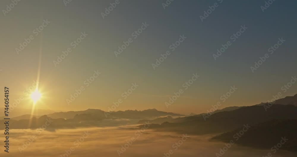 Aerial view scenery sunrise above the sea of mist..Nestled amidst the untouched beauty of Tak Province, .Thi Lo Su Waterfall stands tall as a hidden gem within Umphang Wildlife Sanctuary.. Aerial view scenery sunrise above the sea of mist..Nestled amidst the untouched beauty of Tak Province, .Thi Lo Su Waterfall stands tall as a hidden gem within Umphang Wildlife Sanctuary..