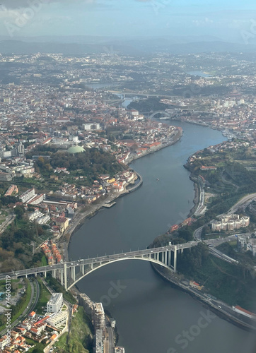 Aerial view of the city Porto and river Douro with Arr  bida Bridge  Porto  Portugal - November 2022
