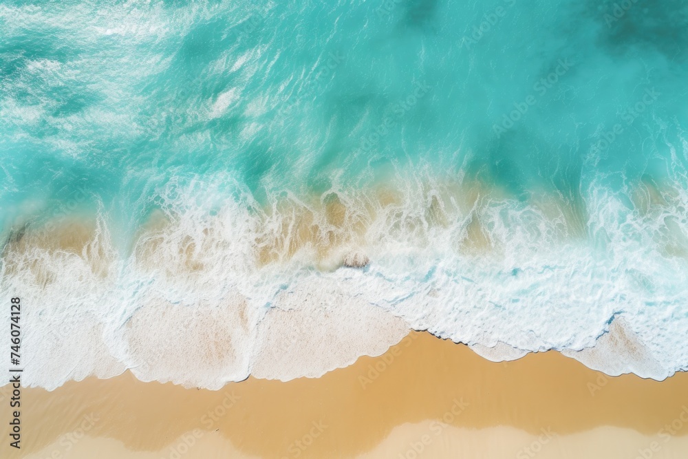 Aerial View of Turquoise Waves Crashing on a Golden Beach Aerial View of Turquoise Waves Crashing on a Golden Beach