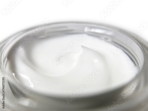close-up glass jar with cosmetic cream