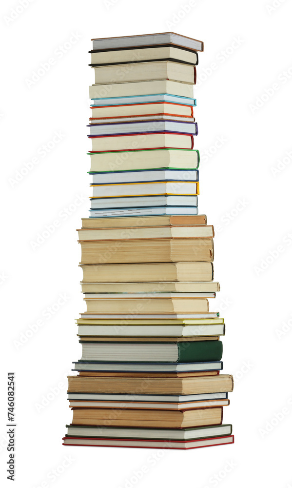 High stack of many different books isolated on white High stack of many different books isolated on white