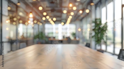 Modern open space office interior with blurred business people 