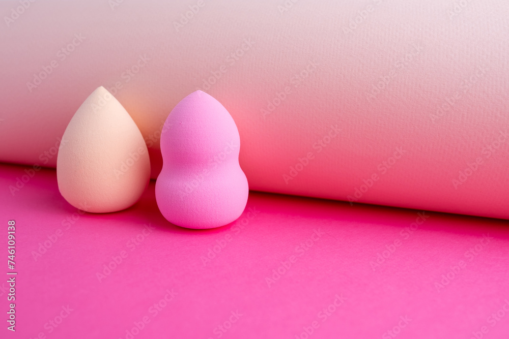 Beauty blender on a colored background. Bright sponges for cosmetics. Makeup products. Beauty concept. Place for text