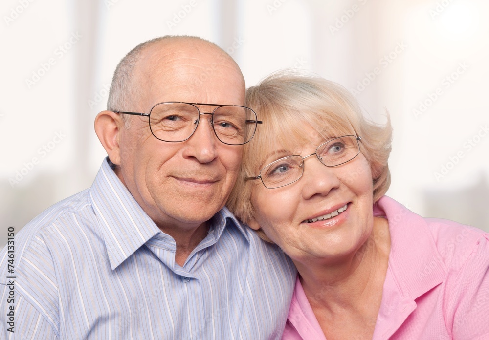 Pensive elderly old man with wife hugging Pensive elderly old man with wife hugging