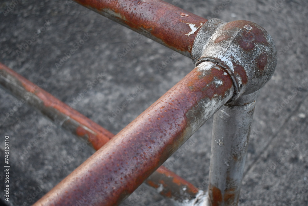 Old rusted railing. Classic styling. Corner piece. Old rusted railing. Classic styling. Corner piece.