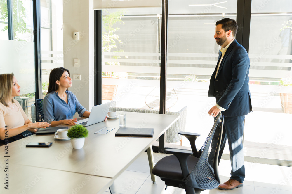 Businessman arriving to a job interview to a meeting room