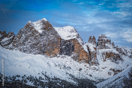 Winter landscape at the Val di Fassa ski resort in the Catinaccio ski area near Vigo di Fassa. January 2024, sunny day.