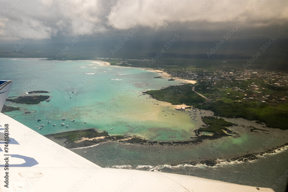Aerial view of the town of Puerto Villamil from the air, after taking off at the Isabela Island airport, Galapagos.