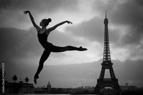 Gymnast leaping by the Eiffel Tower, black and white image