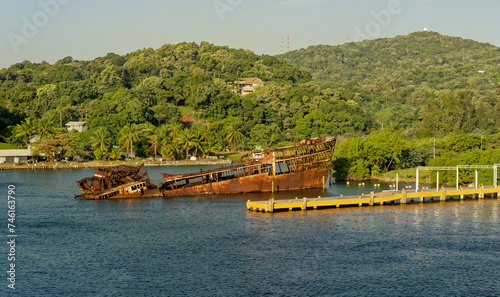 Old Rusty Shipwreck near Dock in Roatan Honduras