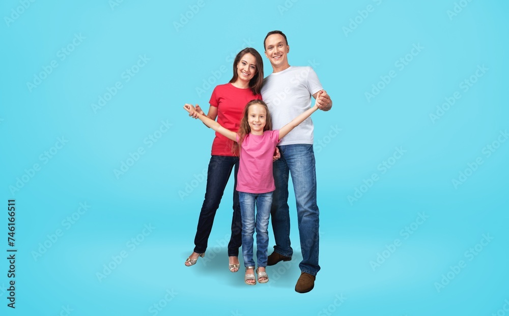 Excited parents with small child posing