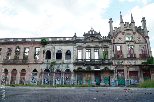 Lost Places. View of an old abandoned facade, remains of a collapsed house built around the turn of the century 1900. Downtown Manaus, Brasil. photo