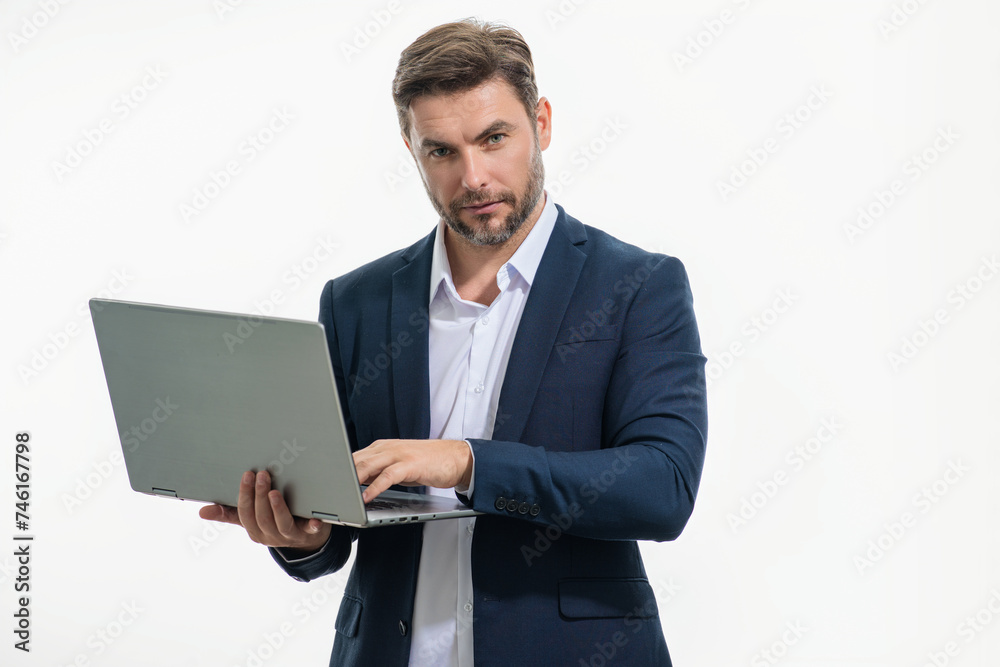 Business man using laptop. Male business man worker watch video on computer laptop. Serious business man hold laptop computer. Caucasian business man in glasses work with laptop, studio portrait. Business man using laptop. Male business man worker watch video on computer laptop. Serious business man hold laptop computer. Caucasian business man in glasses work with laptop, studio portrait.